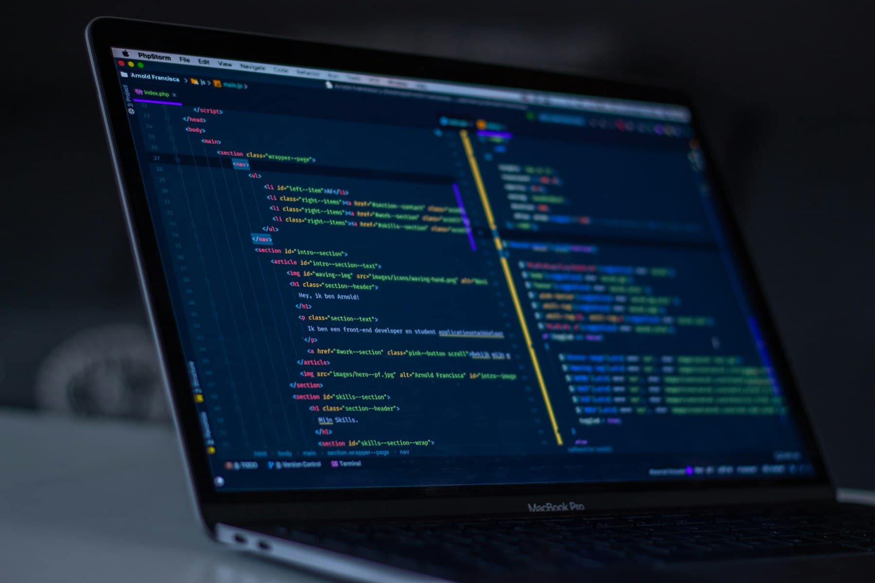Source code open in an editor on a laptop