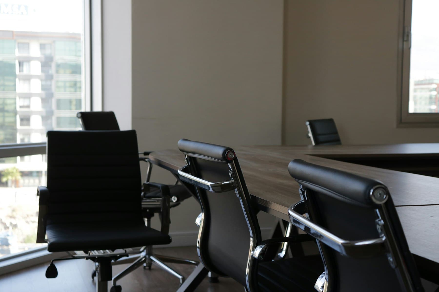 Meeting room with chairs around a table